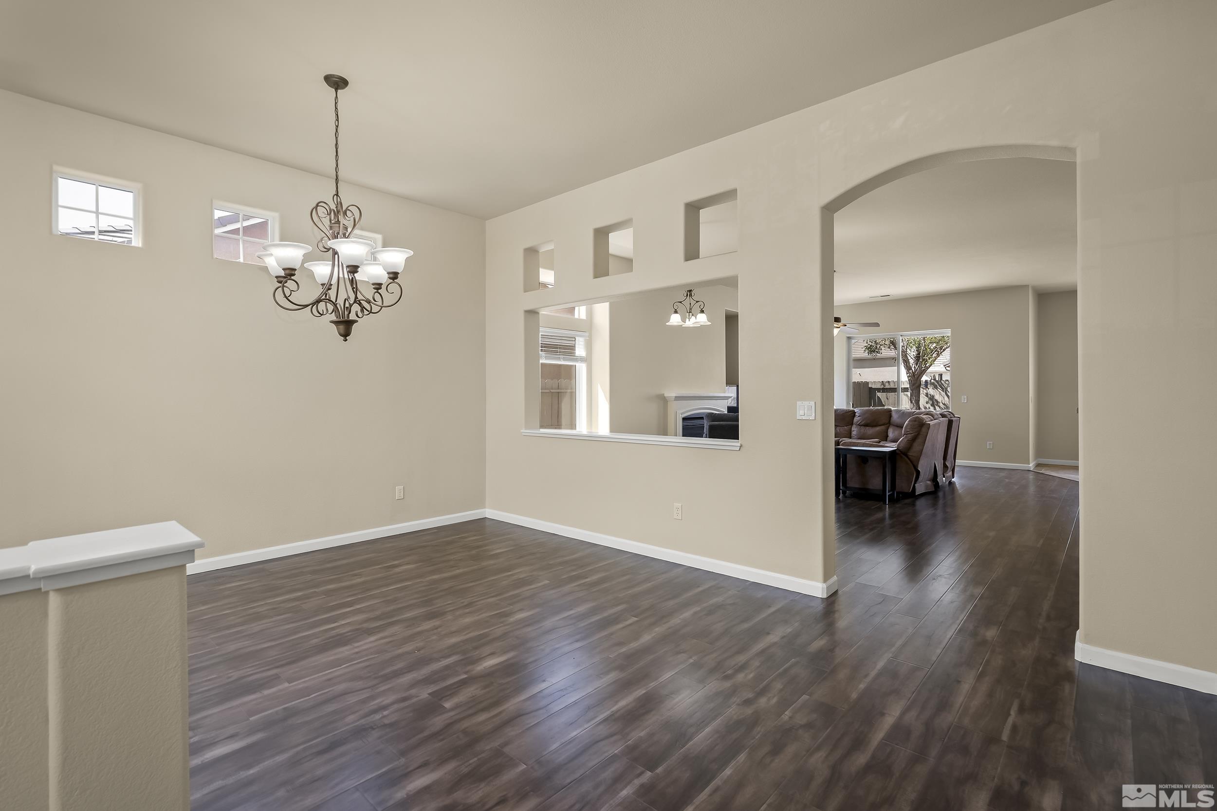 1615 Sewell Drive Reno, NV 89521 - Photo 3 of 25 a view of livingroom with chandelier and wooden floor
