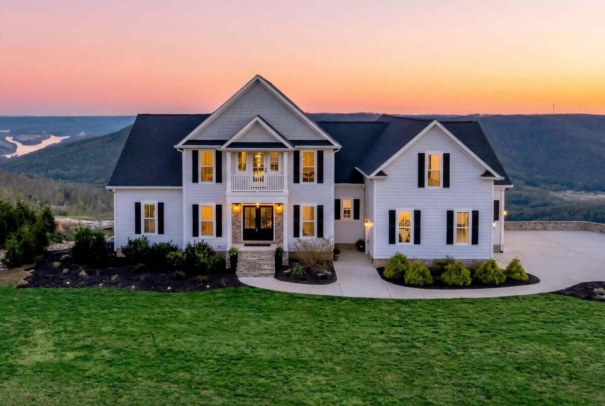 155 Riverview Drive Jasper, TN 37347 - Photo 1 of 100 a front view of a house with a yard