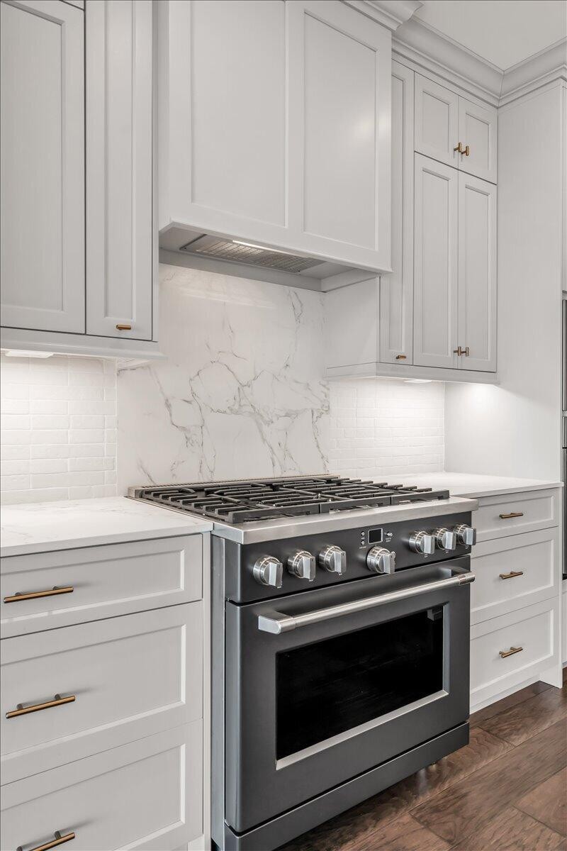 155 Riverview Drive Jasper, TN 37347 - Photo 19 of 100 a stove top oven sitting inside of a kitchen
