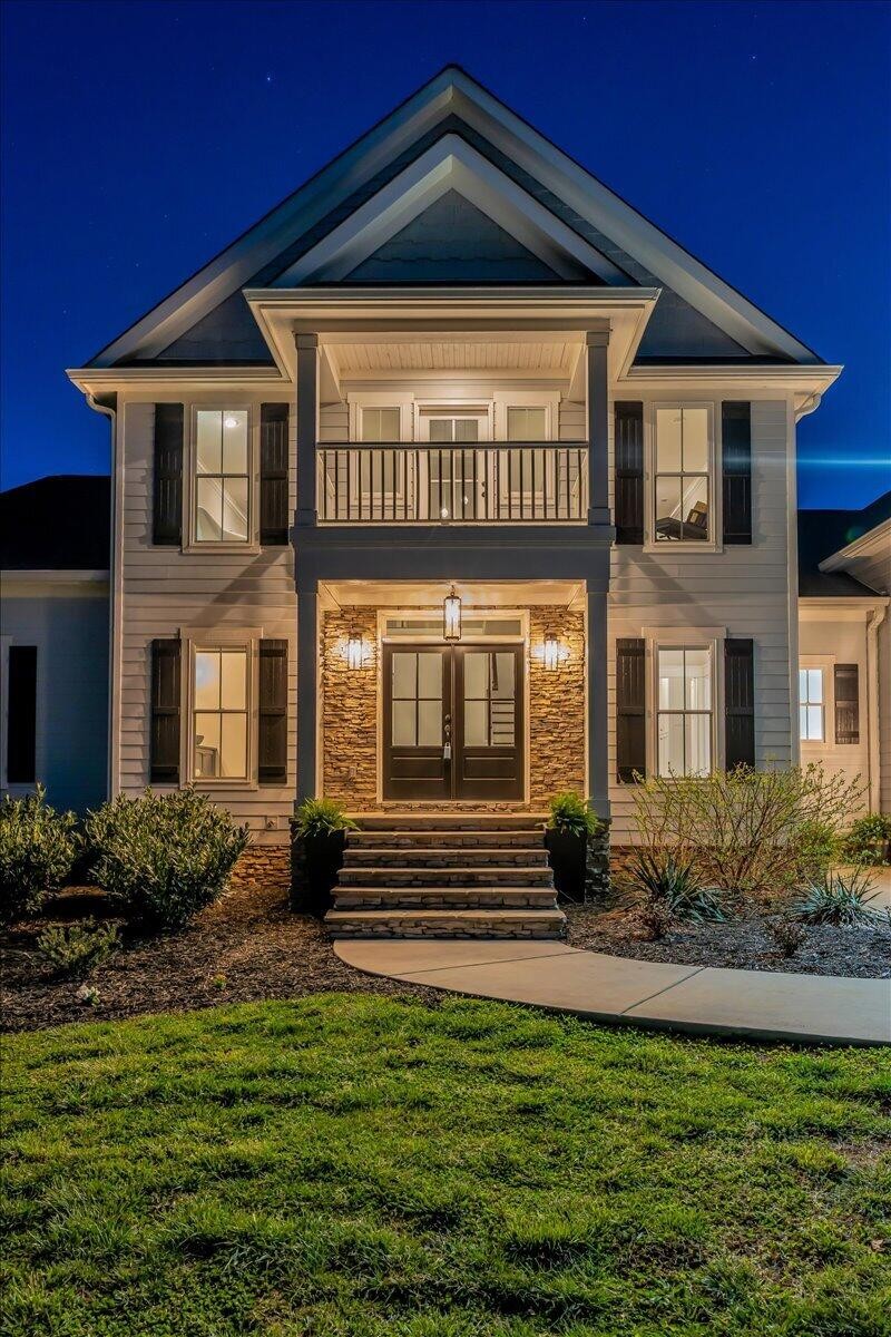 155 Riverview Drive Jasper, TN 37347 - Photo 2 of 100 a front view of a house with garden
