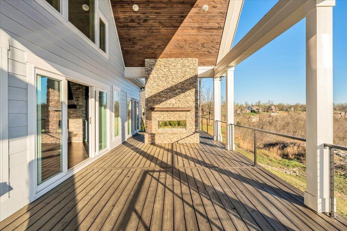155 Riverview Drive Jasper, TN 37347 - Photo 37 of 100 a view of a balcony with wooden floor
