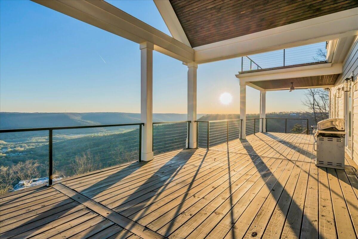 155 Riverview Drive Jasper, TN 37347 - Photo 43 of 100 a bedroom with a bed and a view of balcony