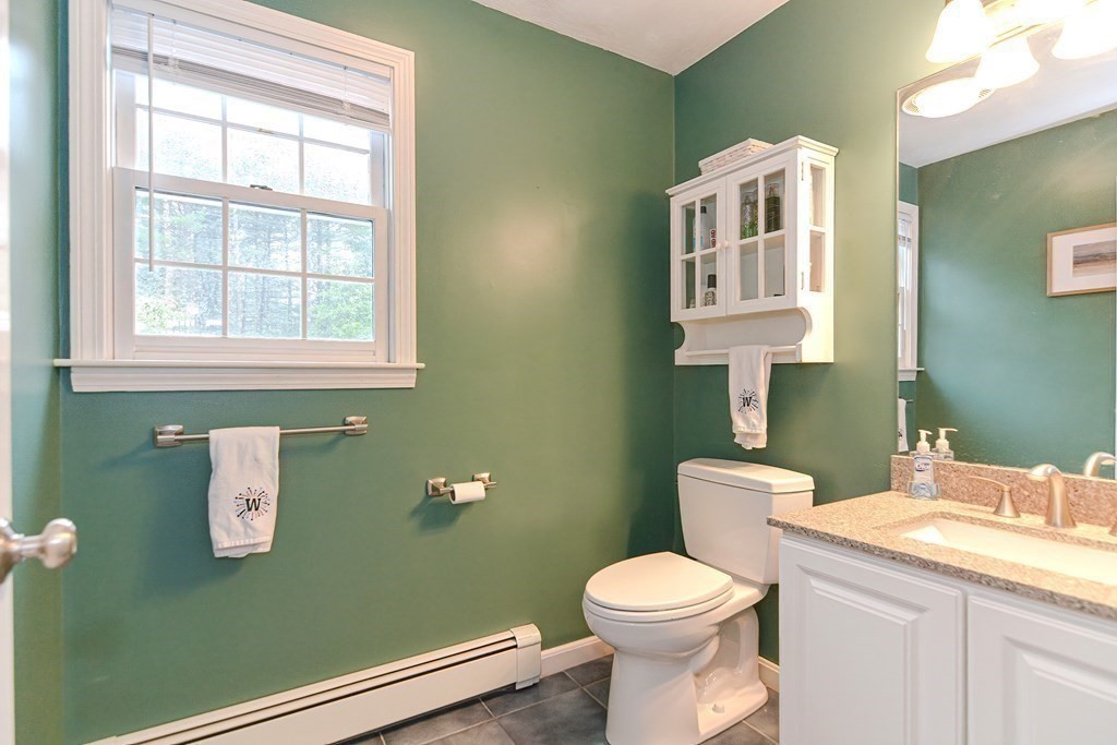 5 Post Road Foxboro, MA 02035 - Photo 16 of 37 a bathroom with a toilet sink and mirror