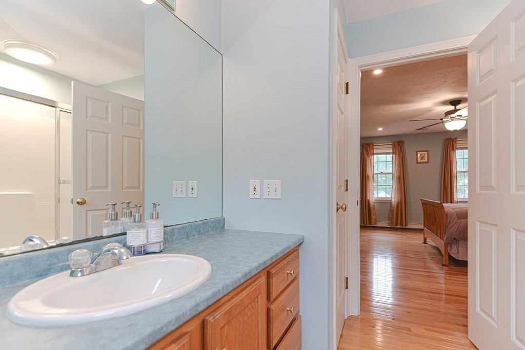 5 Post Road Foxboro, MA 02035 - Photo 21 of 37 a en suite bathroom with a sink and a mirror