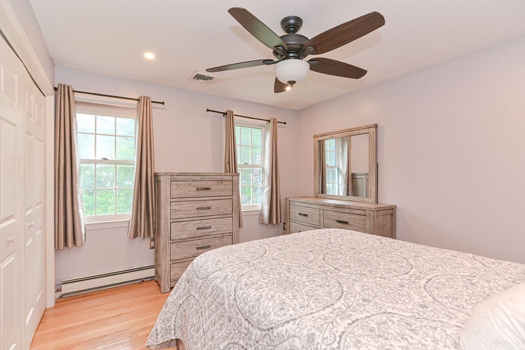 5 Post Road Foxboro, MA 02035 - Photo 27 of 37 a bedroom with a bed dresser and a window
