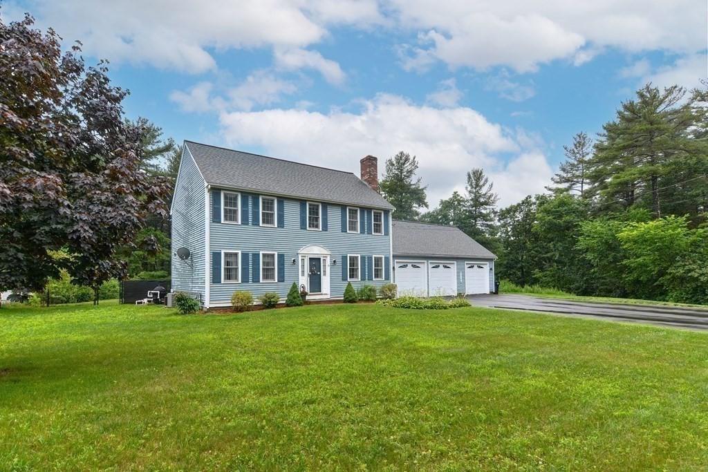 5 Post Road Foxboro, MA 02035 - Photo 4 of 37 a view of a house with a big yard and large trees