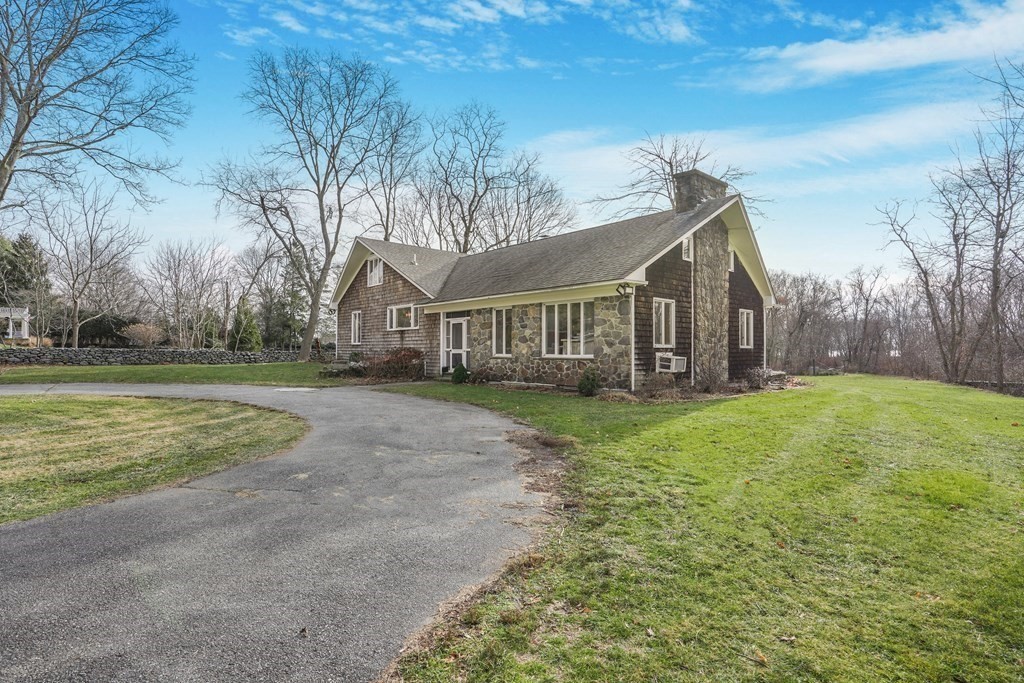 5 Maple Road Warren, RI 02885 - Photo 5 of 41 a view of a house with backyard and trees