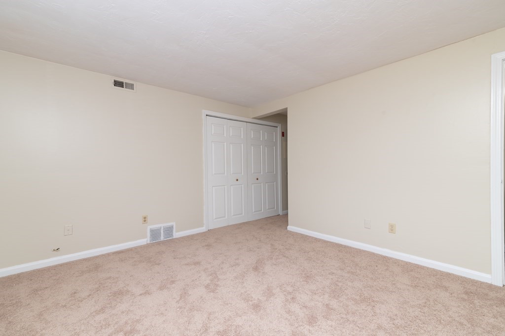 24 Bettys Pond Road, Unit K Barnstable, MA 02601 - Photo 8 of 16 a view of an empty room