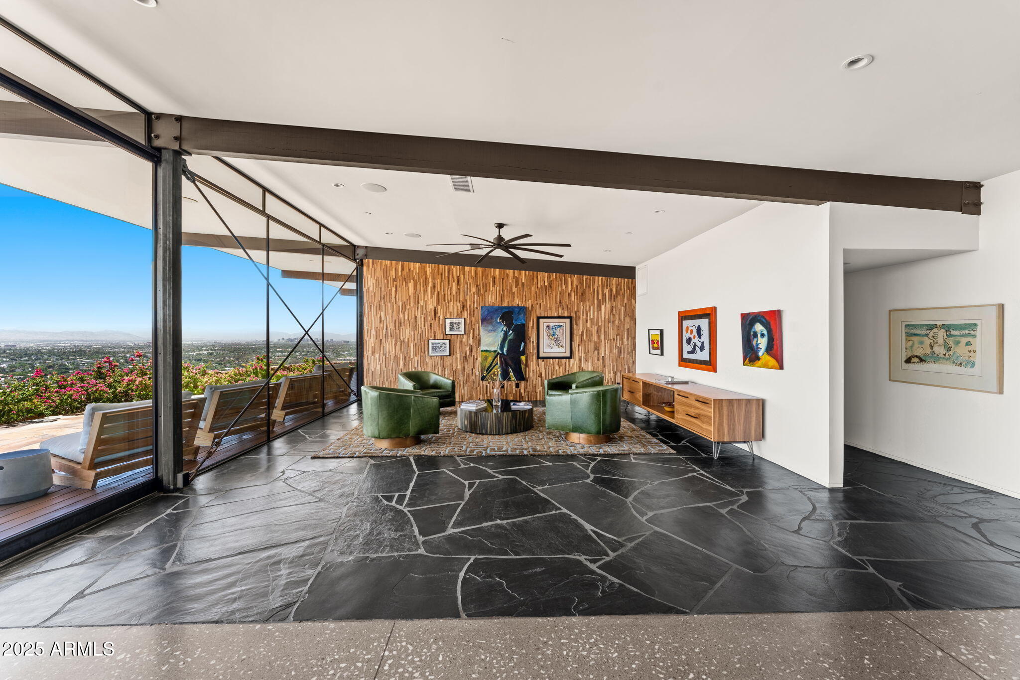 4925 East Red Rock Drive, Unit 43 Phoenix, AZ 85018 - Photo 19 of 99 a living room with furniture city view and large windows