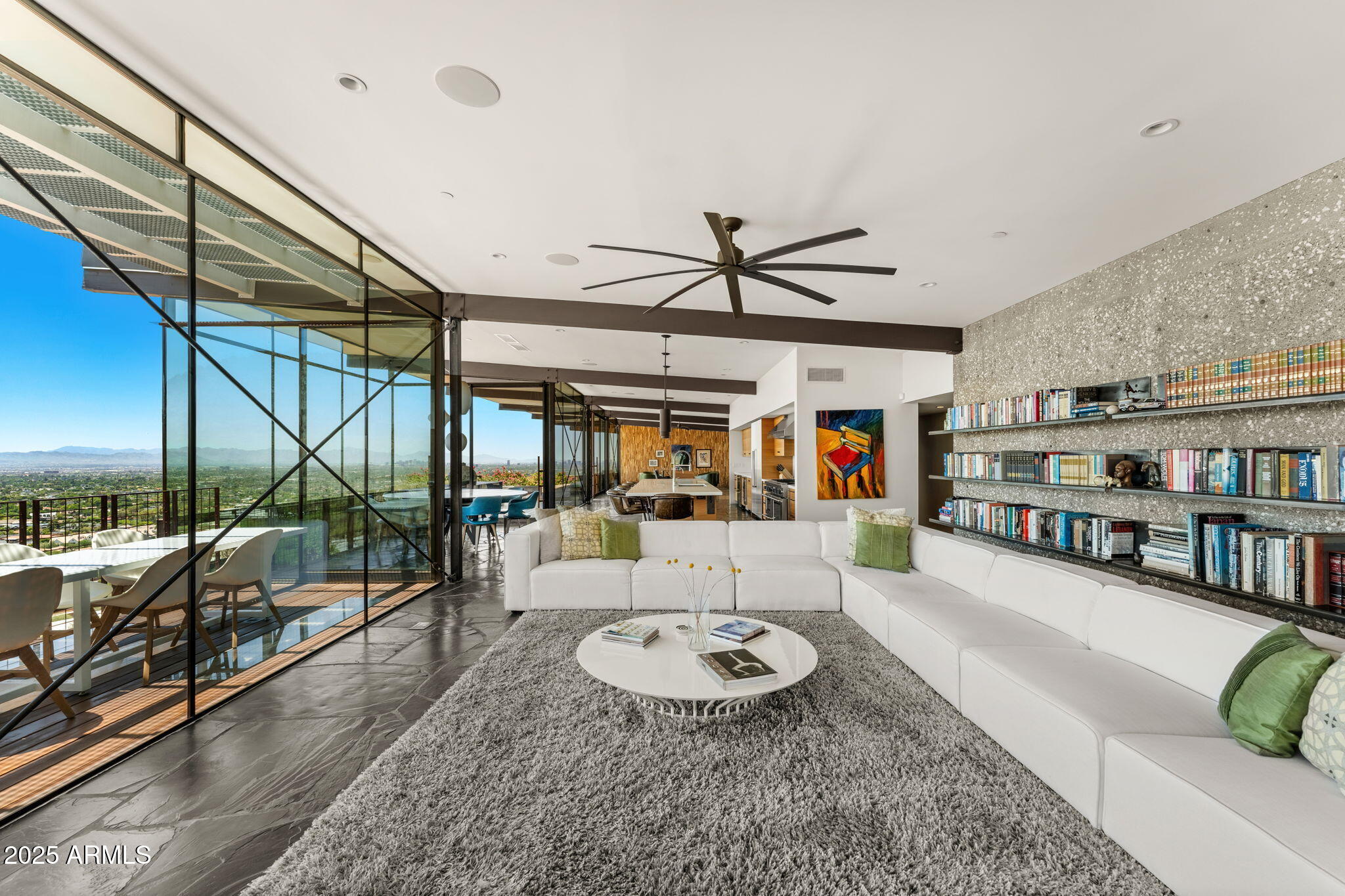 4925 East Red Rock Drive, Unit 43 Phoenix, AZ 85018 - Photo 33 of 99 a living room with furniture a ceiling fan and a rug