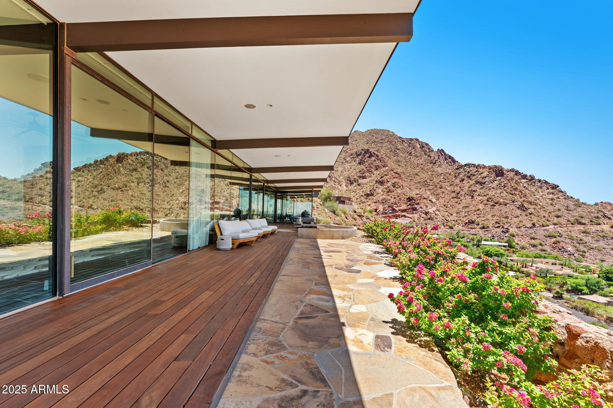 4925 East Red Rock Drive, Unit 43 Phoenix, AZ 85018 - Photo 39 of 99 a view of balcony with pathway