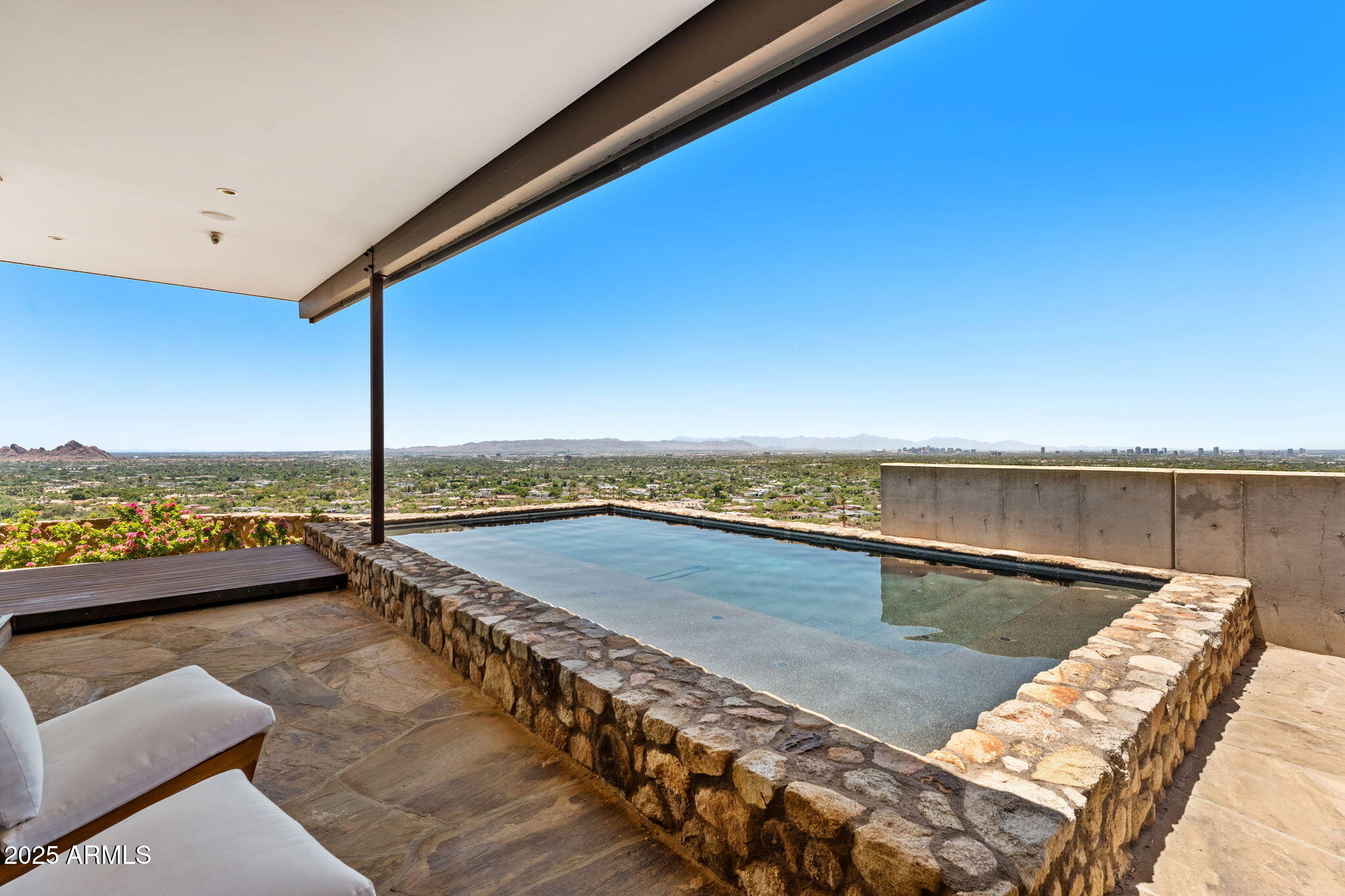 4925 East Red Rock Drive, Unit 43 Phoenix, AZ 85018 - Photo 40 of 99 a view of a balcony with an ocean view