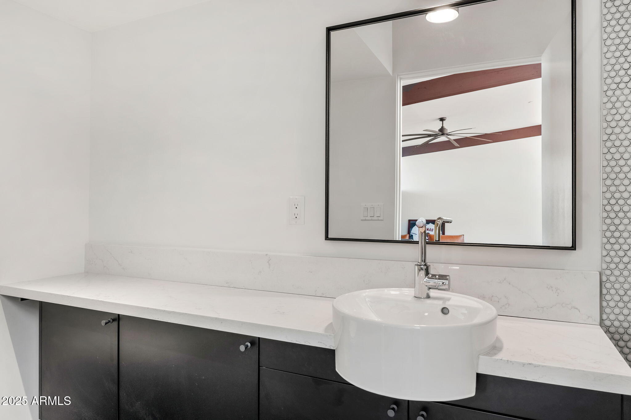 4925 East Red Rock Drive, Unit 43 Phoenix, AZ 85018 - Photo 69 of 99 a bathroom with a sink and a bathtub