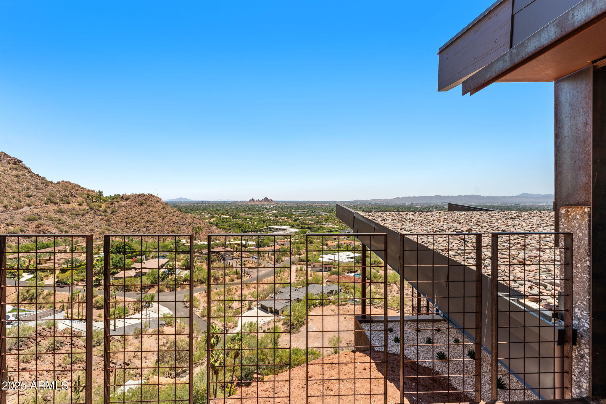 4925 East Red Rock Drive, Unit 43 Phoenix, AZ 85018 - Photo 72 of 99 a view of a city and a mountain view