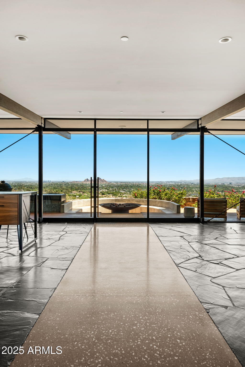 4925 East Red Rock Drive, Unit 43 Phoenix, AZ 85018 - Photo 84 of 99 a view of an ocean and floor to ceiling window