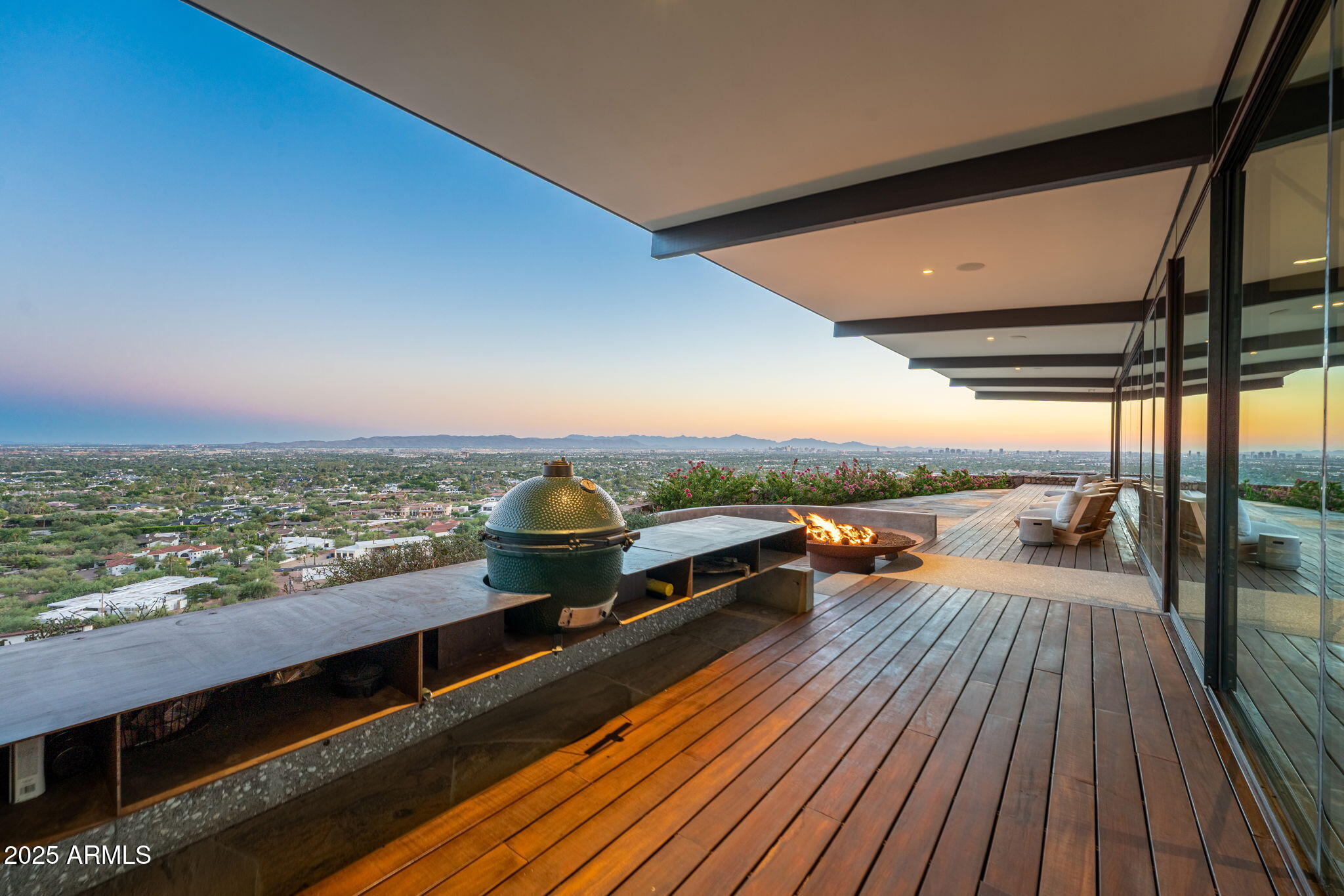 4925 East Red Rock Drive, Unit 43 Phoenix, AZ 85018 - Photo 94 of 99 a view of roof deck with seating space and wooden floor