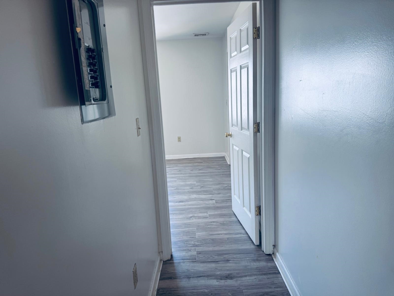 161 West 53rd Street, Unit 2 Bayonne, NJ 07002 - Photo 13 of 19 wooden floor in a gallery