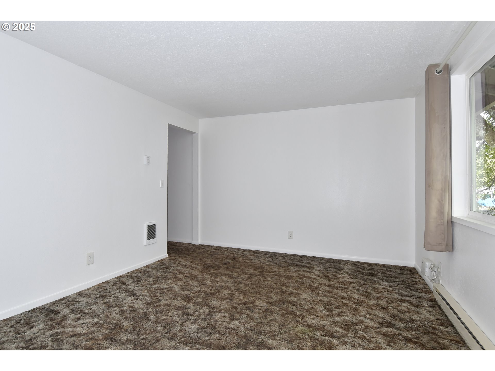 1126 South Jasper Street Cornelius, OR 97113 - Photo 16 of 47 an empty room with an entryway
