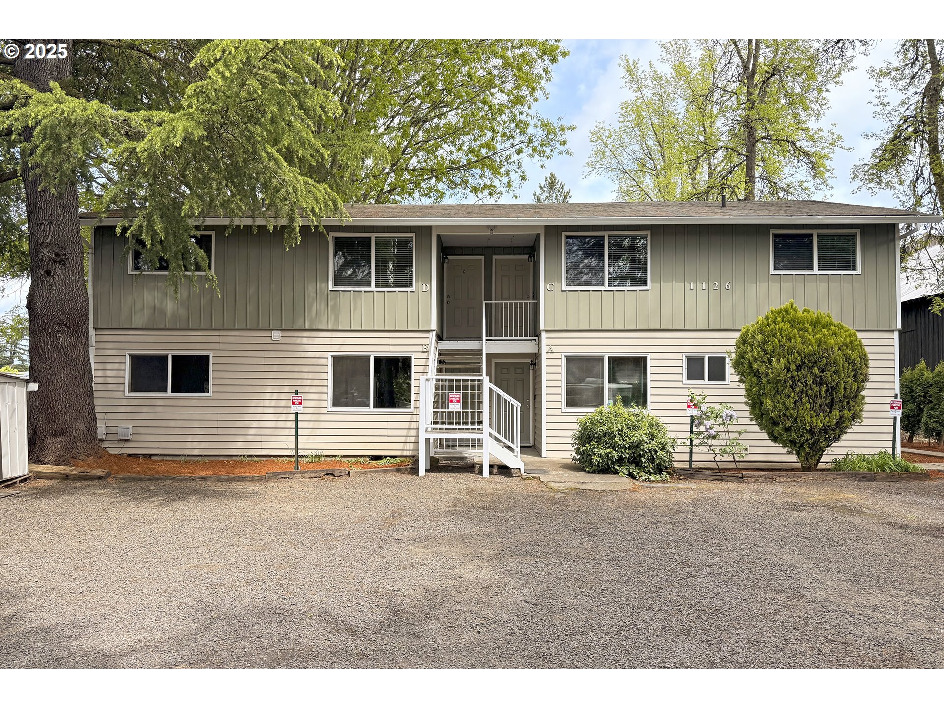 1126 South Jasper Street Cornelius, OR 97113 - Photo 2 of 47 a front view of a house with a garden