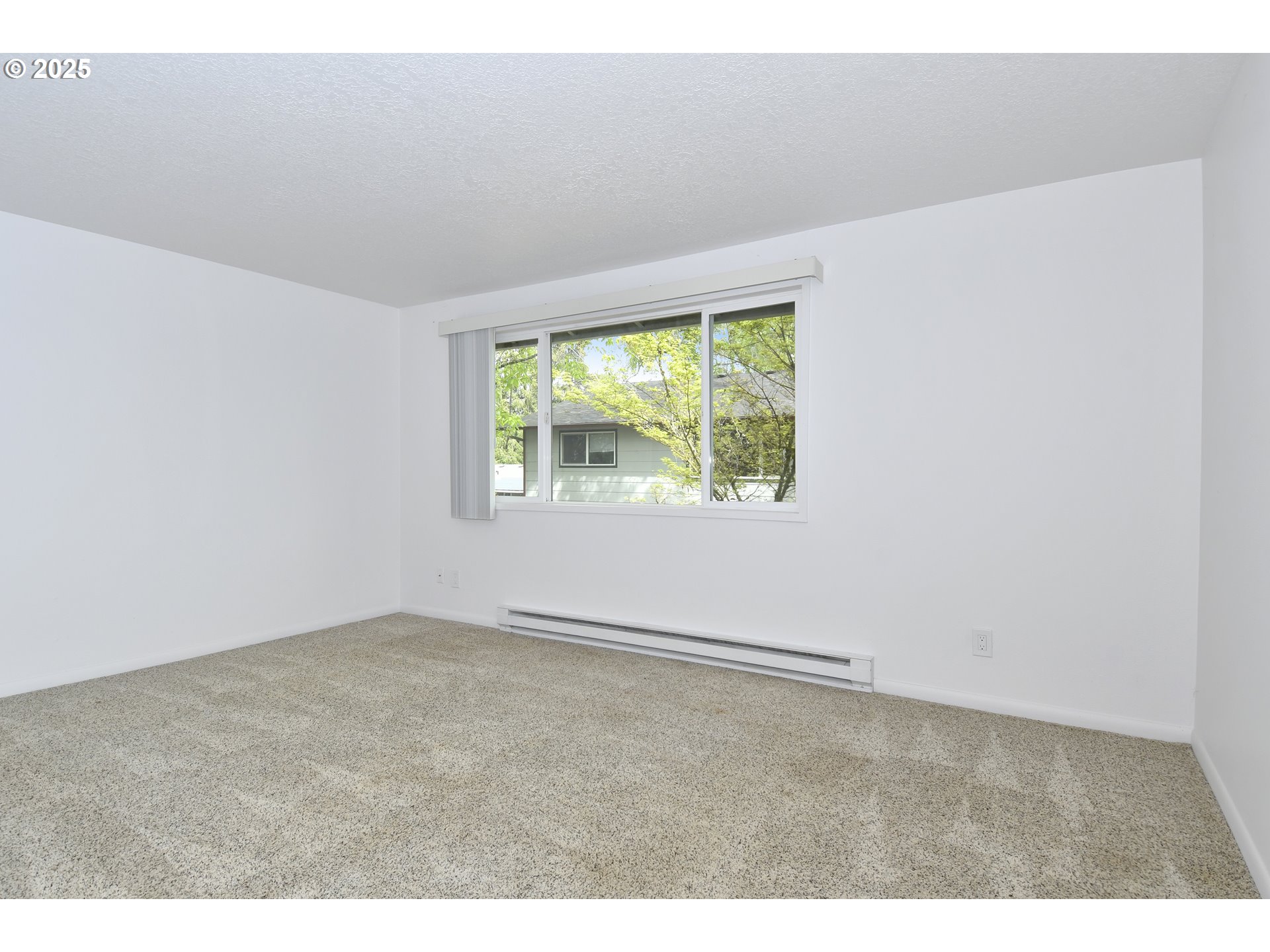 1126 South Jasper Street Cornelius, OR 97113 - Photo 27 of 47 an empty room with windows