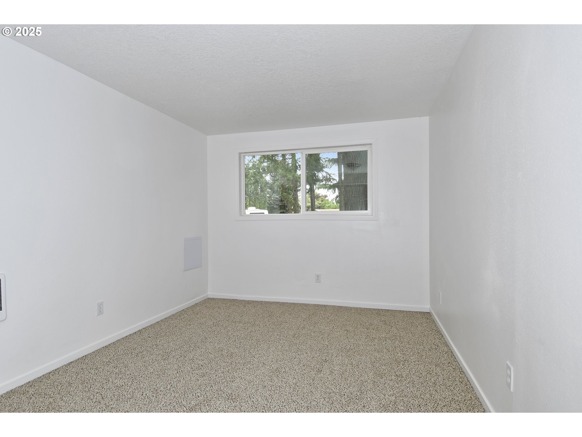 1126 South Jasper Street Cornelius, OR 97113 - Photo 35 of 47 an empty room with windows