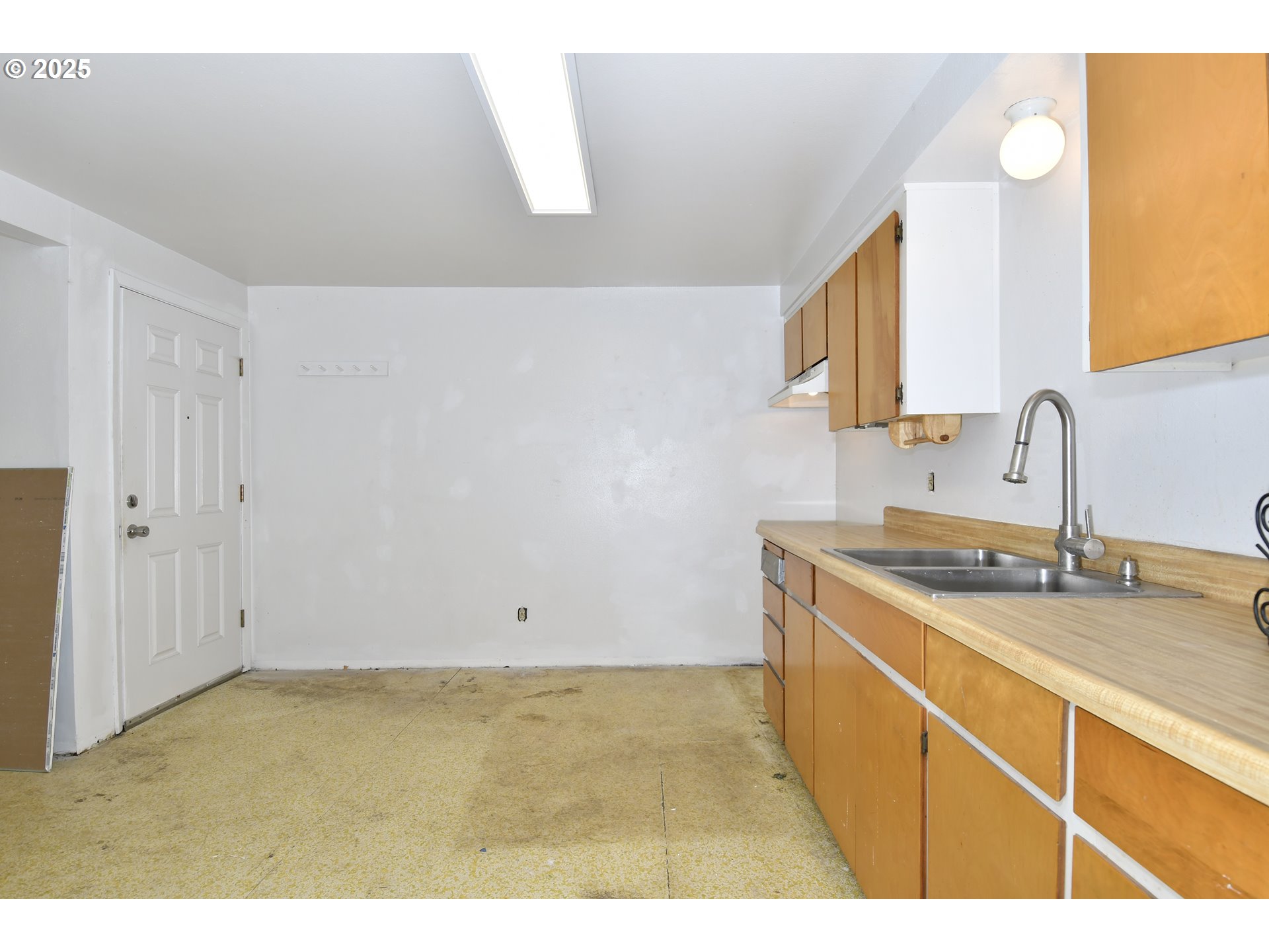 1126 South Jasper Street Cornelius, OR 97113 - Photo 41 of 47 a kitchen with a sink and cabinets