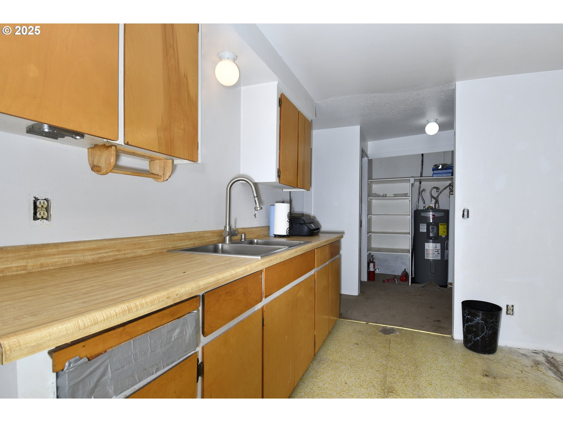 1126 South Jasper Street Cornelius, OR 97113 - Photo 42 of 47 a kitchen with a sink and cabinets