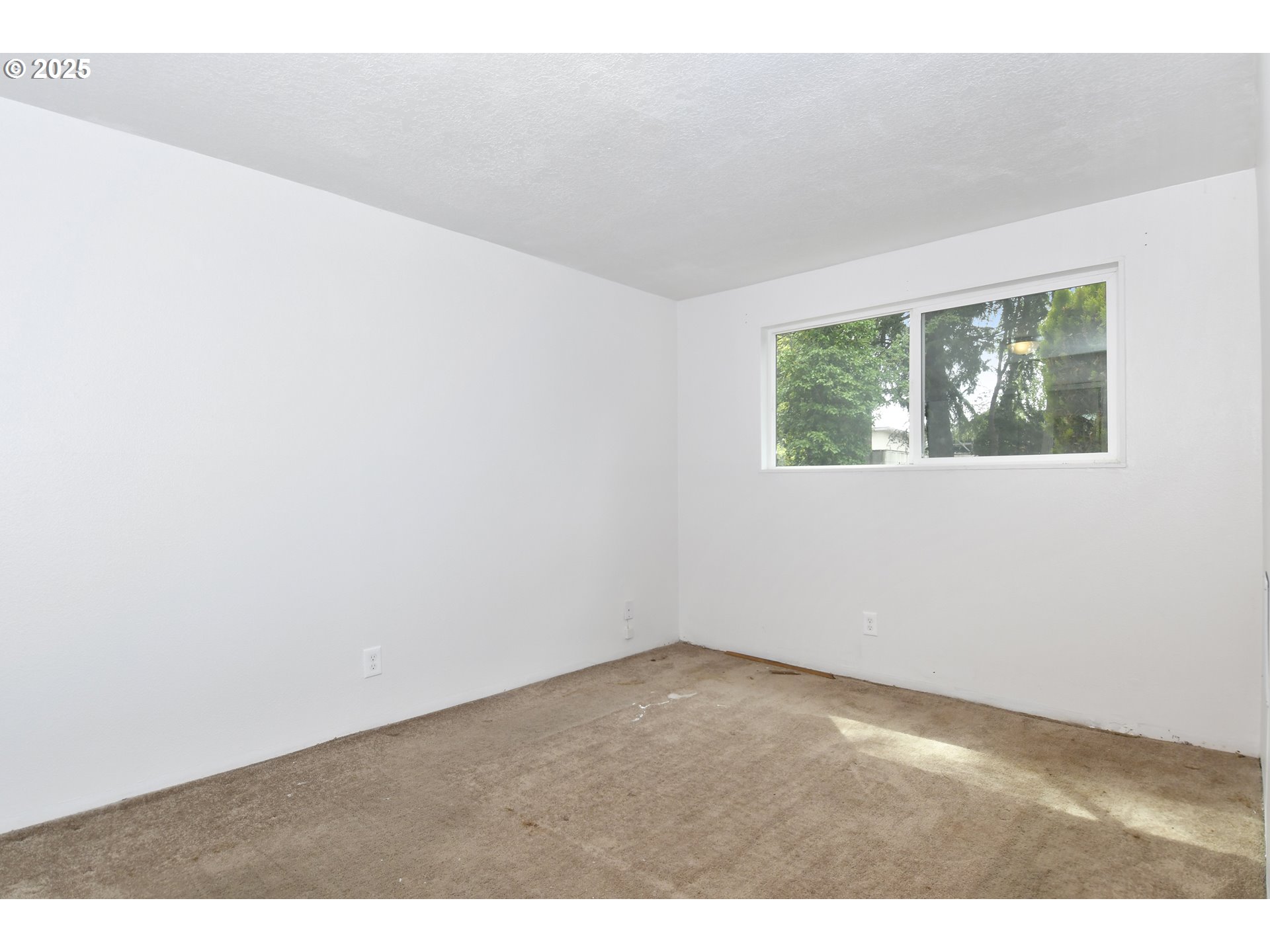 1126 South Jasper Street Cornelius, OR 97113 - Photo 44 of 47 an empty room with windows