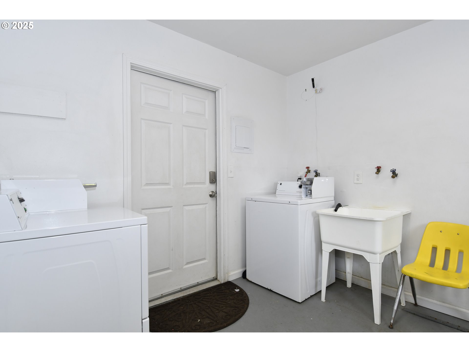 1126 South Jasper Street Cornelius, OR 97113 - Photo 6 of 47 a utility room with cabinets washer and dryer