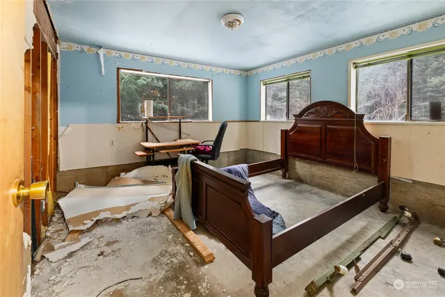 a living room with a couch and a table