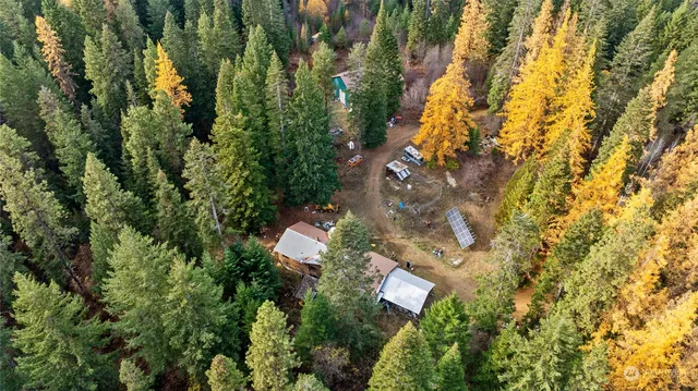 a view of a house with a tree park
