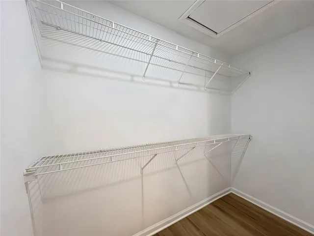 a view of a room with racks on the wall