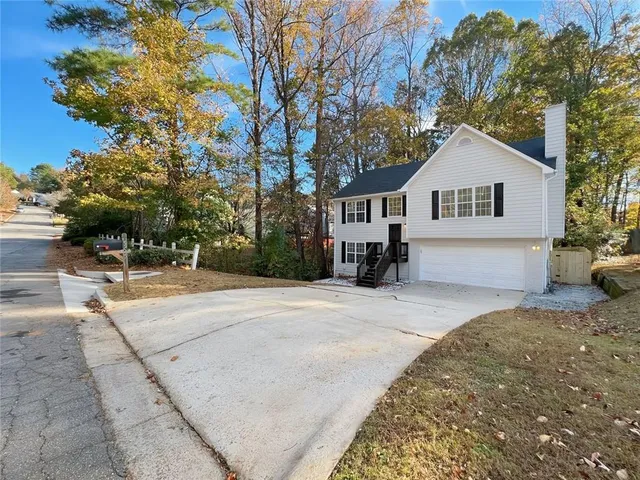 a house view with a outdoor space