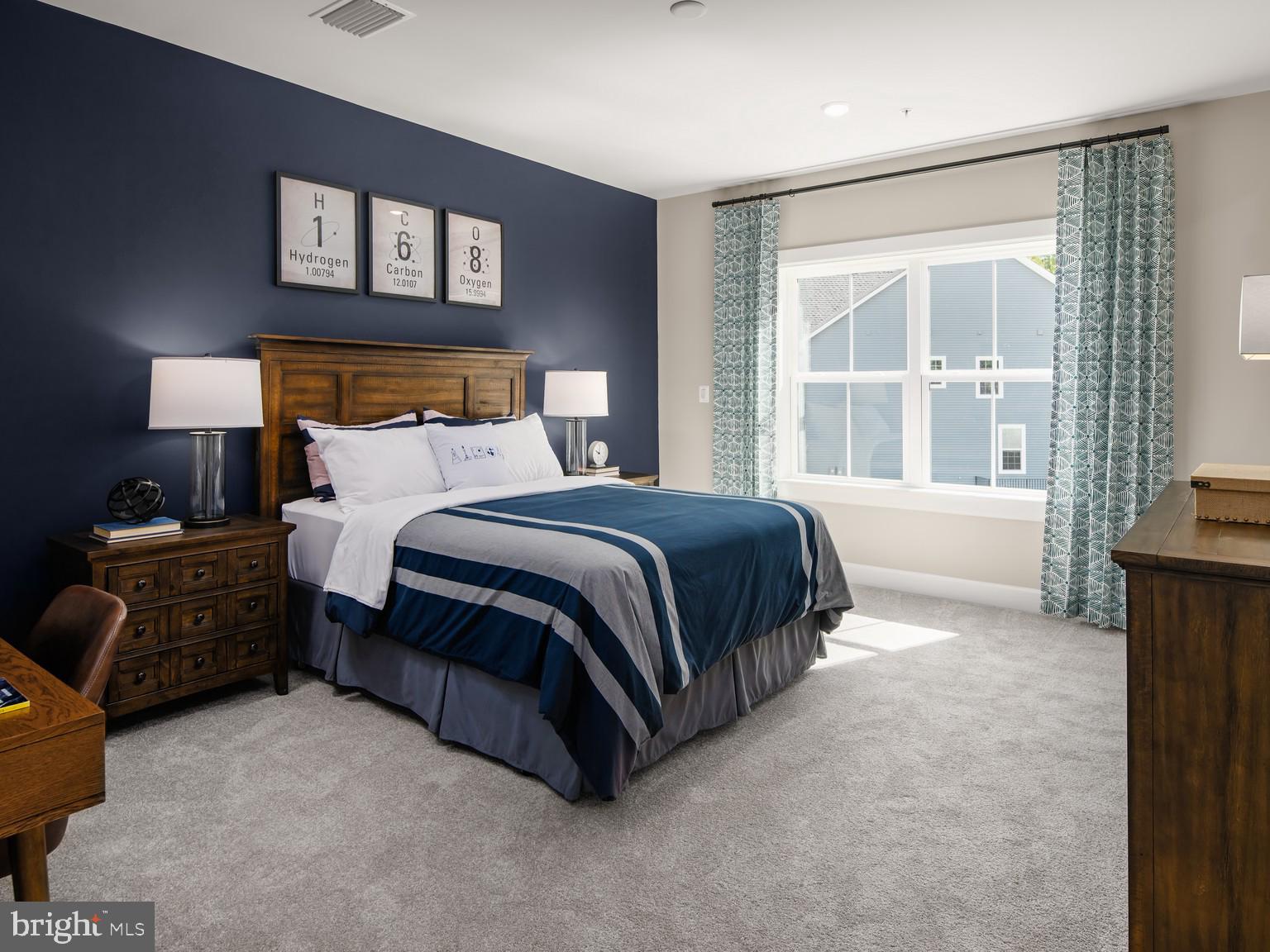 1222 Bear Branch Road Laurel, MD 20708 - Photo 12 of 17 a bedroom with a bed and a couch