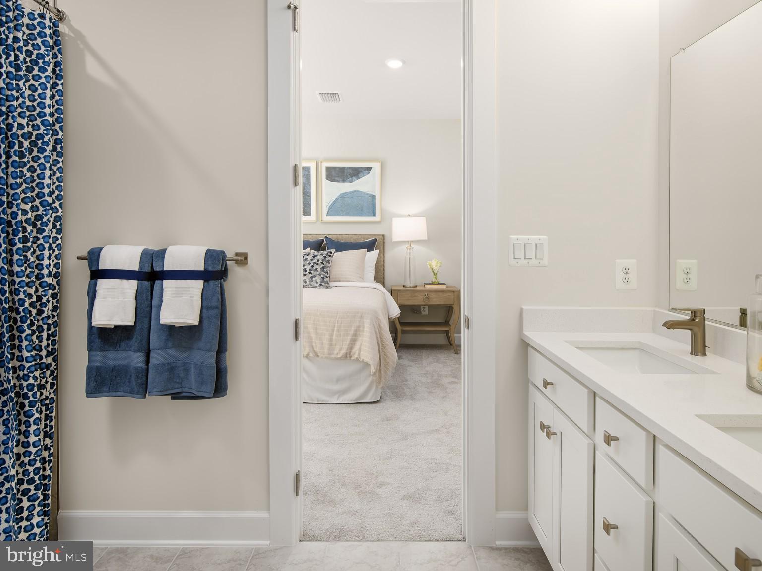 1222 Bear Branch Road Laurel, MD 20708 - Photo 13 of 17 a en suite bathroom with a sink and a mirror