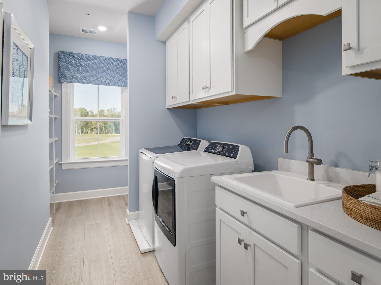 1222 Bear Branch Road Laurel, MD 20708 - Photo 14 of 17 a utility room with sink dryer and washer