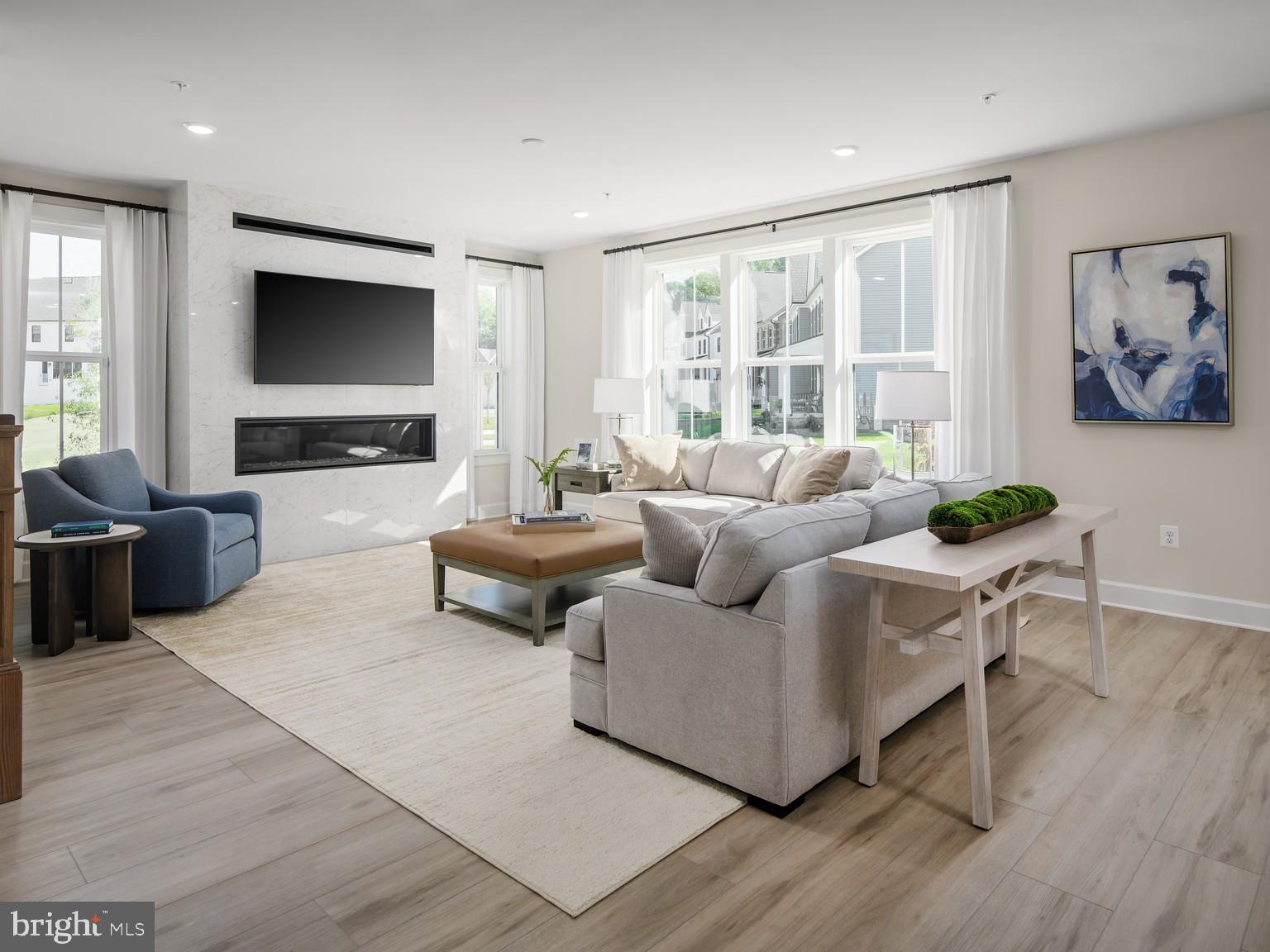 1222 Bear Branch Road Laurel, MD 20708 - Photo 3 of 17 a living room with furniture and a flat screen tv