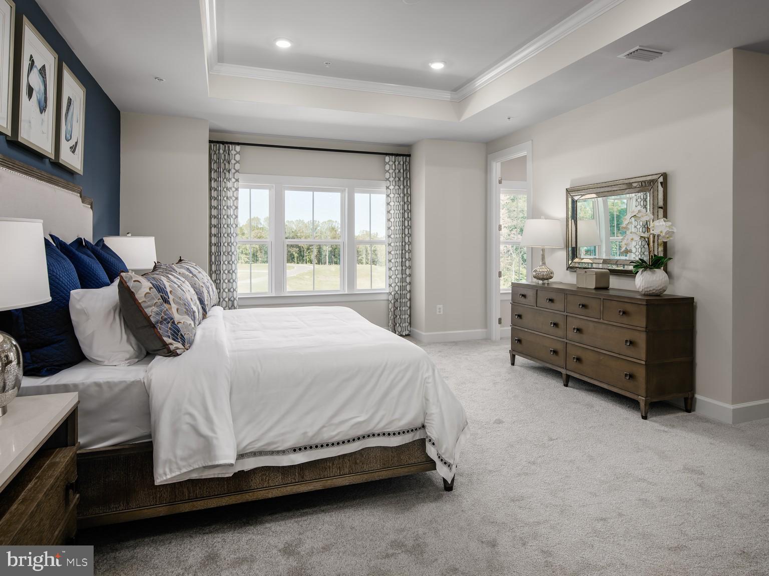 1222 Bear Branch Road Laurel, MD 20708 - Photo 8 of 17 a bedroom with a bed and a window