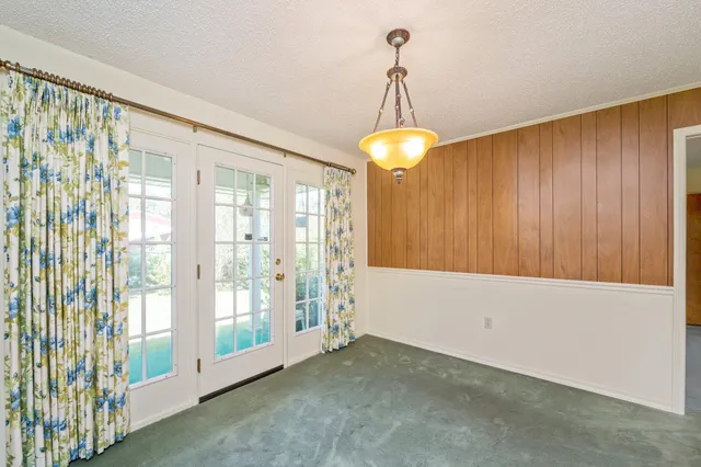 a view of a room with windows