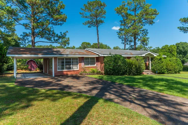 a view of a house with a swimming pool