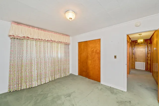 a bathroom with a sink a mirror and a toilet