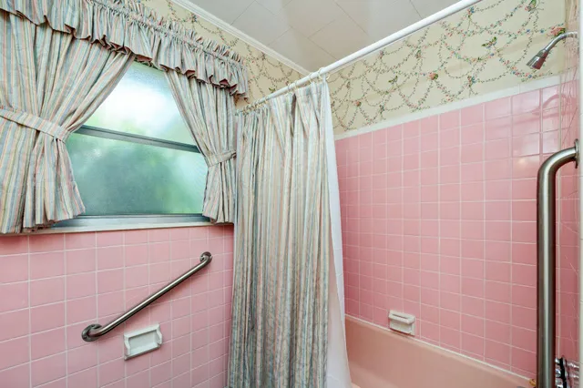 a bathroom with a bathtub