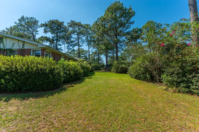 a view of a porch with a yard