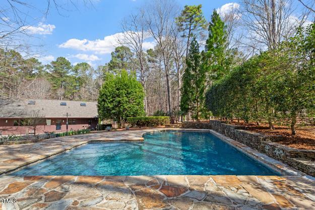 10729 Trego Trail Raleigh, NC 27614 - Photo 58 of 65 The saltwater pool offers a private retreat for swimmers.