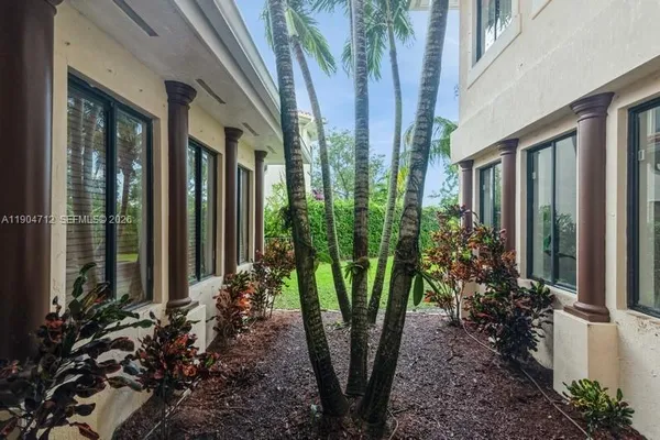 a view of a potted plants in front of house