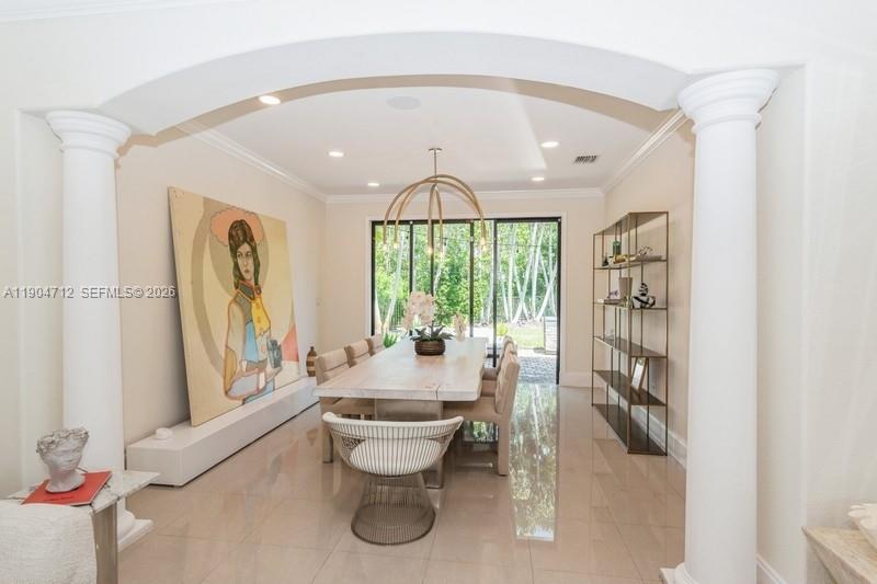 18704 Southwest 76th Court Cutler Bay, FL 33157 - Photo 6 of 47 a large white room with a large window and furniture