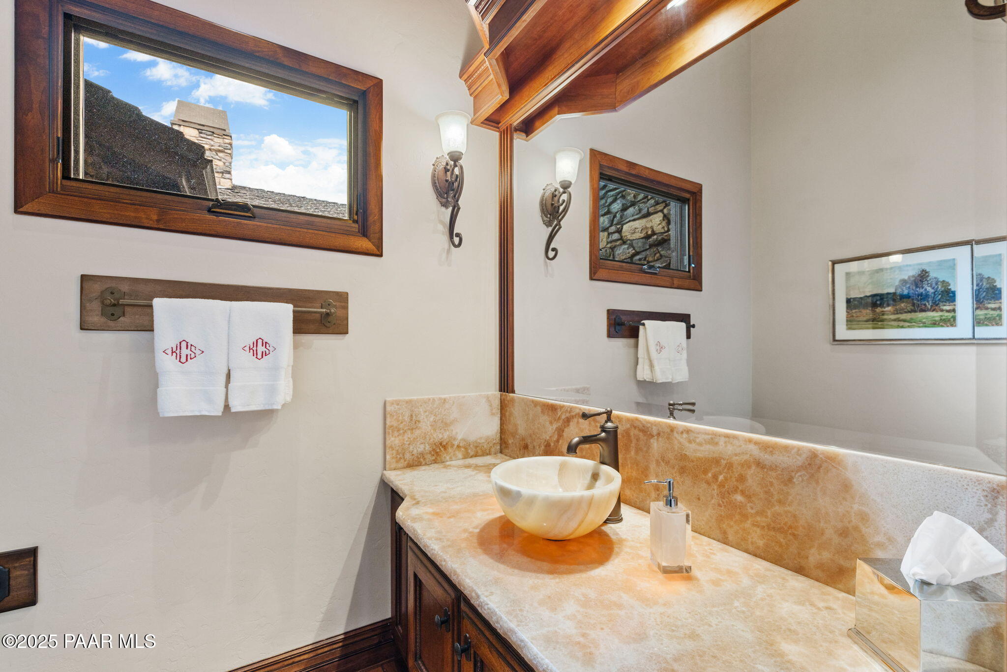 5350 West Three Forks Road Prescott, AZ 86305 - Photo 51 of 99 a bathroom with a granite countertop sink and a mirror