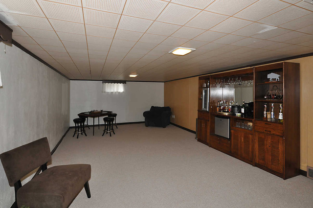 334 Stratford Road Des Plaines, IL 60016 - Photo 8 of 16 a lobby with furniture and a chandelier