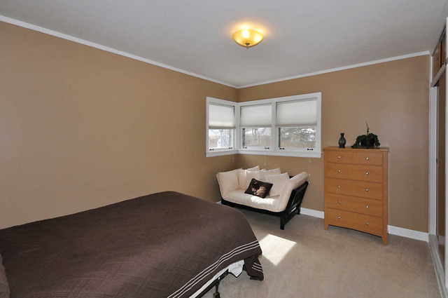 334 Stratford Road Des Plaines, IL 60016 - Photo 10 of 16 a living room with furniture and a window