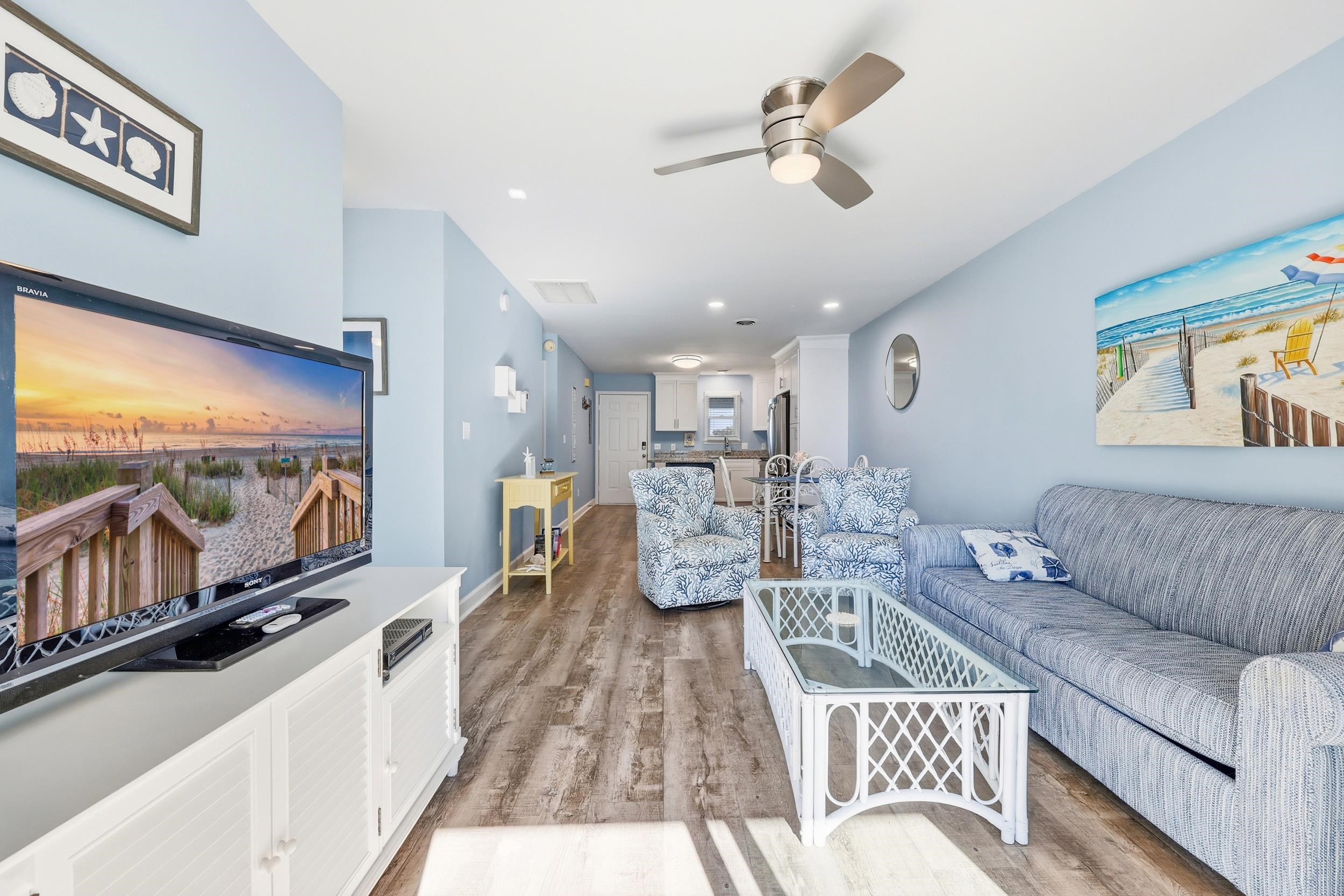 2001 Spring Street, Unit H2 North Myrtle Beach, SC 29582 - Photo 11 of 25 Living area with light wood-type flooring, ceiling fan, and recessed lighting